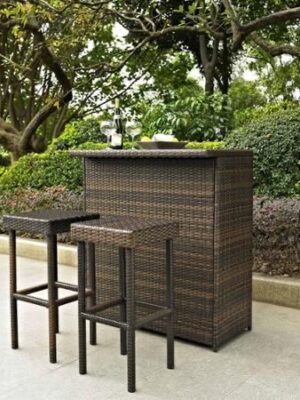 Outdoor rattan bar table with matching bar stools on a patio, featuring dark woven wicker design by Outadore Space