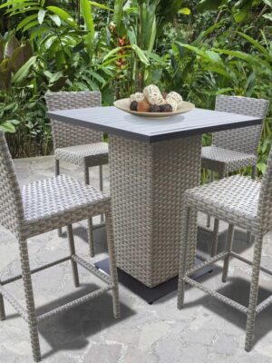 Outdoor wicker bar dining set with high chairs and square table in a garden patio setting by Outadore Space