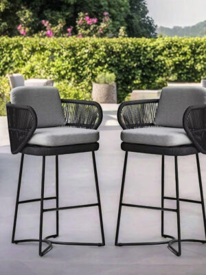 Pair of outdoor rope bar stools with cushioned seats and metal frames on a modern patio by Outadore Space