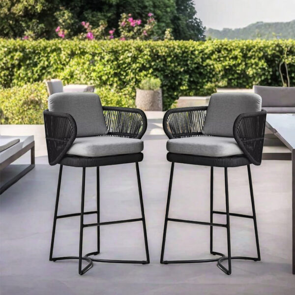 Pair of outdoor rope bar stools with cushioned seats and metal frames on a modern patio by Outadore Space