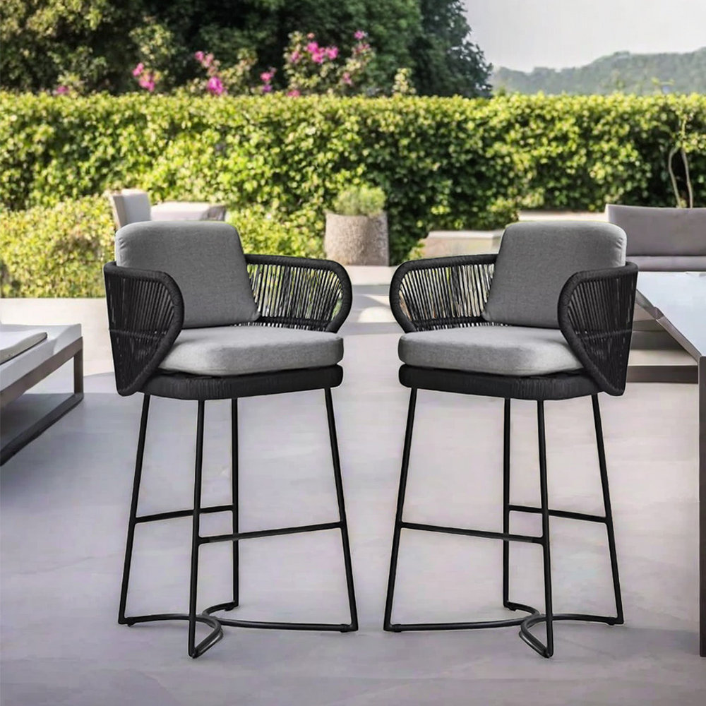 Pair of outdoor rope bar stools with cushioned seats and metal frames on a modern patio by Outadore Space